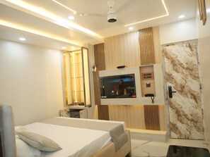 Premium bedding, memory foam beds, laptop workspace, free WiFi - Happy Residency (Patna)