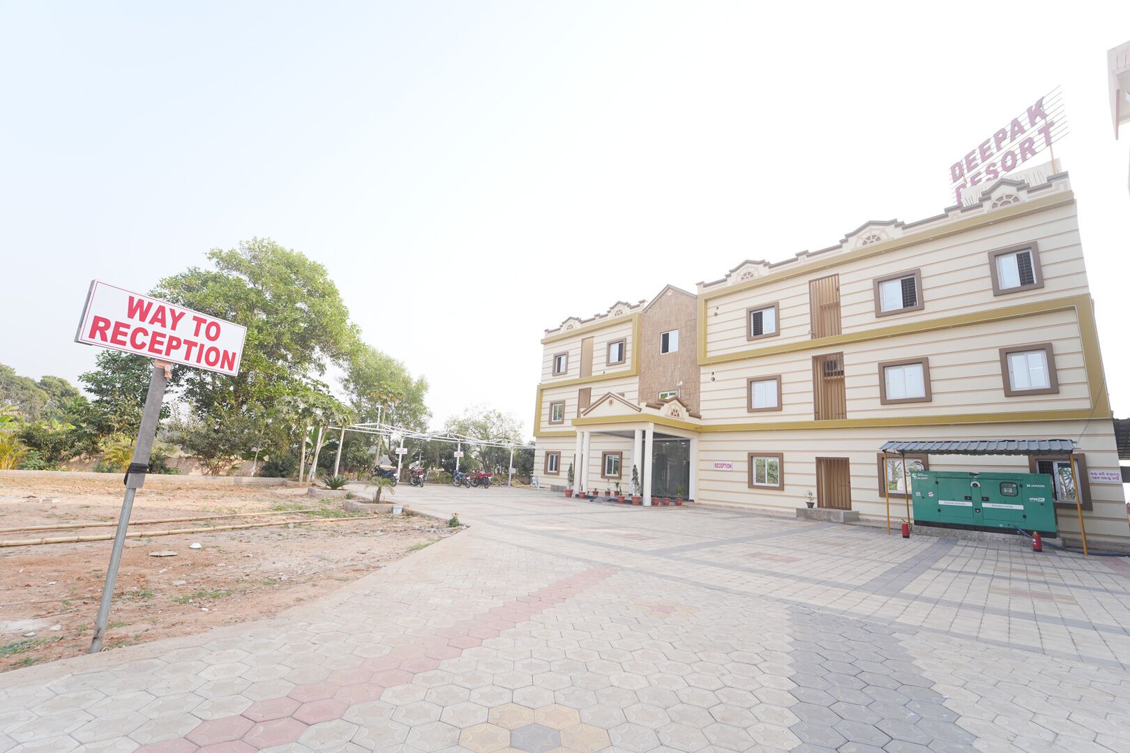 A building with a reception area and a sign indicating a way to reception.