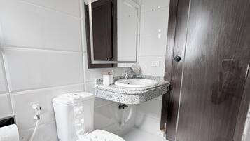 Comfort Double Room, City View | Bathroom | Shower, free toiletries, hair dryer, slippers