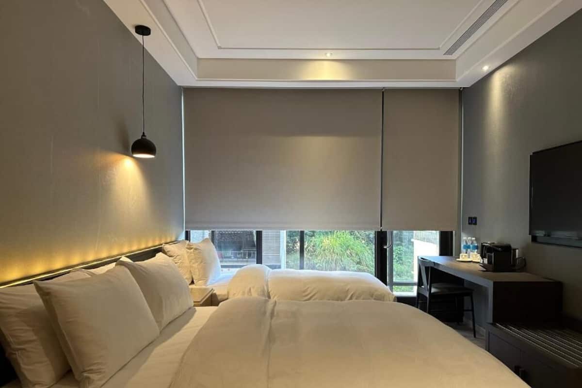 Classic Triple Room, City View