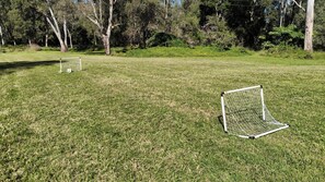 A grassy field with two soccer goals. - Relaxing country home half way between Gold Coast and Brisbane (Wolffdene)