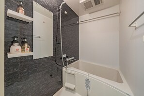 Standard Double Room, 1 Queen Bed with Sofa bed, Non Smoking | Bathroom | Combined shower/tub, hair dryer, towels, shampoo - Apartment Hotel 11 Dotonbori 8 (Osaka)