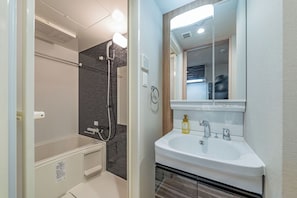 Standard Double Room, 1 Double Bed with Sofa bed, Non Smoking | Bathroom | Combined shower/tub, hair dryer, towels, shampoo - Apartment Hotel 11 Dotonbori 8 (Osaka)