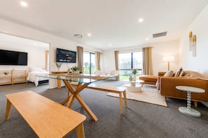 TV - Spacious 4BR Home | Spa and Two Lounges + Games (Christchurch)