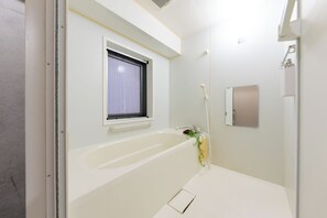 Basic Apartment, Balcony, City View | Bathroom | Combined shower/tub, free toiletries, hair dryer, bidet - Stayloop Hirai (Tokyo)