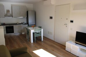 Apartment, Balcony, Courtyard View | Living area - Flamingo Houses (Quartu Sant'Elena)