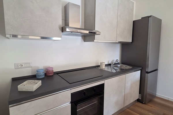 Apartment, Balcony, Courtyard View | Private kitchen | Espresso maker, coffee/tea maker, electric kettle, dining table