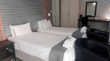 Deluxe Double or Twin Room, Patio, Garden View | In-room safe, blackout curtains, iron/ironing board, free WiFi