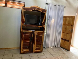 Doppia Deluxe, vista giardino | Interni