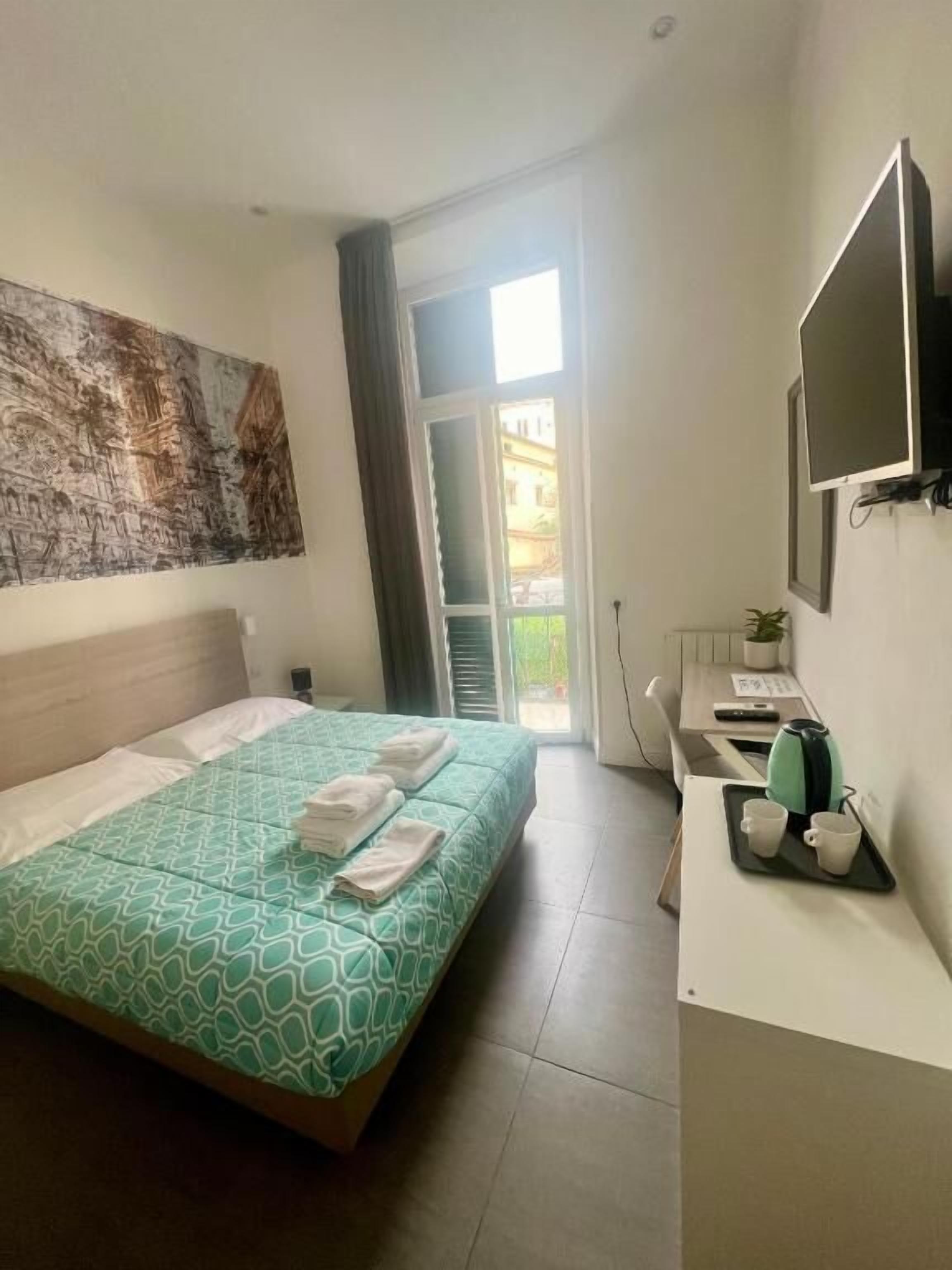 Double Room, Balcony, Courtyard View | In-room safe, iron/ironing board, free WiFi