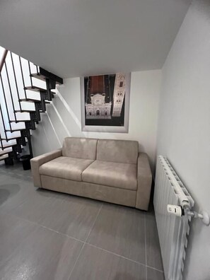 Deluxe-Doppelzimmer, Balkon, Stadtblick | Wohnbereich