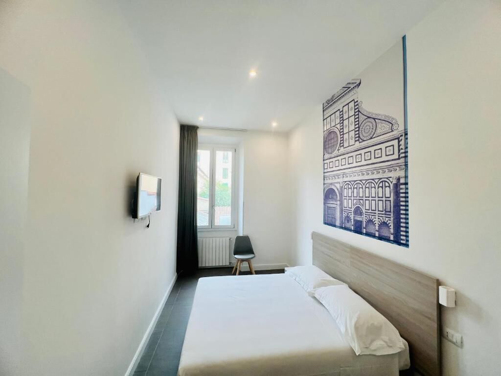 Quadruple Room, Garden View | In-room safe, iron/ironing board, free WiFi