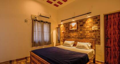 Golden Loom 2BHK Homestay by Homeyhuts