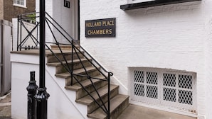 A staircase leading to a white building with a sign reading "Holland Place Chambers." - FiveM High Street Kensington (London)