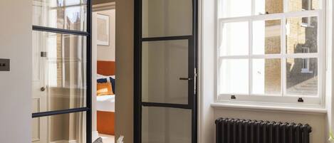 Apartment, 1 Bedroom | Living area | 40-inch Smart TV with digital channels