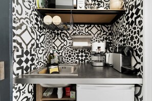 Fridge, microwave, coffee/tea maker, electric kettle