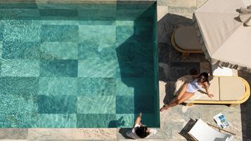 Seasonal outdoor pool, pool umbrellas