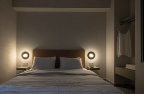 Suite Deluxe, balcó | Caixa forta a l'habitació i cortines opaques 