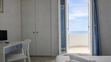 Double or Twin Room, Sea View | Desk, free WiFi, bed sheets