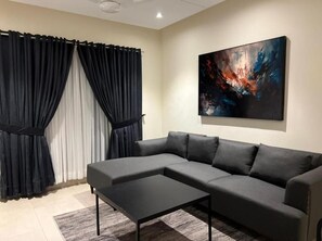 Apartment, Balcony, City View | Living area - Luxor Apartments & Suites - Indigo (Lahore)