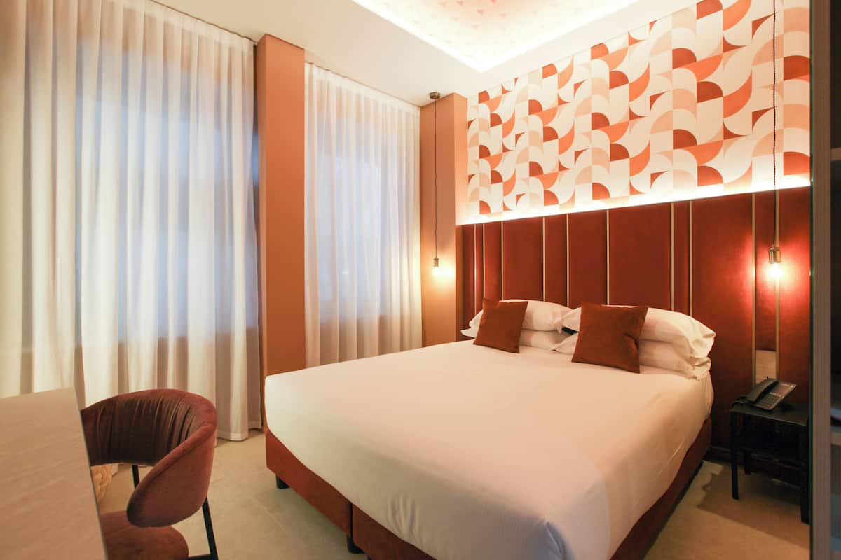 Chambre Deluxe double ou avec lits jumeaux | Coffre-fort, rideaux dâobscurcissement, systĂšme dâinsonorisation