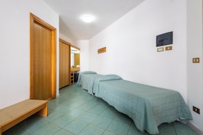 Chambre Quadruple | Coffres-forts dans les chambres, lits bébé (gratuits), Wi-Fi gratuit