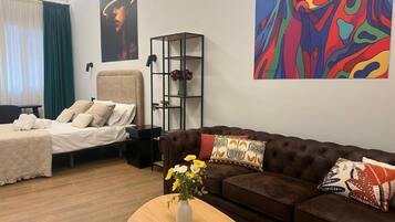 Habitación doble Deluxe | Área de sala de estar