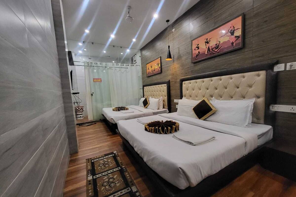 Deluxe Quadruple Room, Balcony | Desk, free WiFi