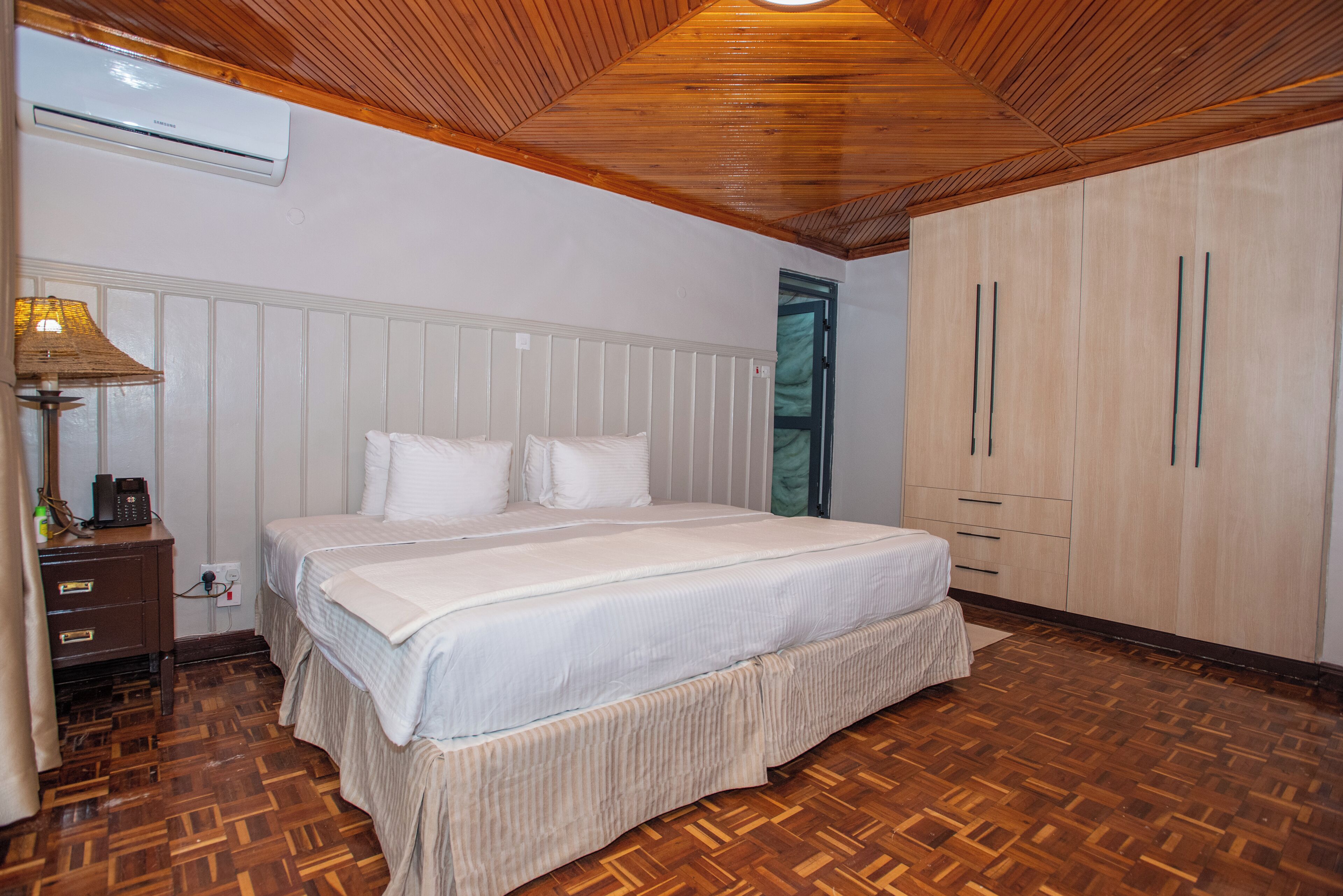 Deluxe Double or Twin Room, 1 King Bed, Air conditioning, Garden View | In-room safe, desk, laptop workspace, blackout drapes