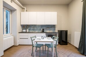 Dining - GuestHost - Cozy studio-flat of 45 sqm, perfect for 2 people, located on the ground floor of a building.The property is located in the Pescarenico district of Lecco, a historic neighborhood associated with Alessandro Manzoni's The Betrothed, in a well- (Lecco)