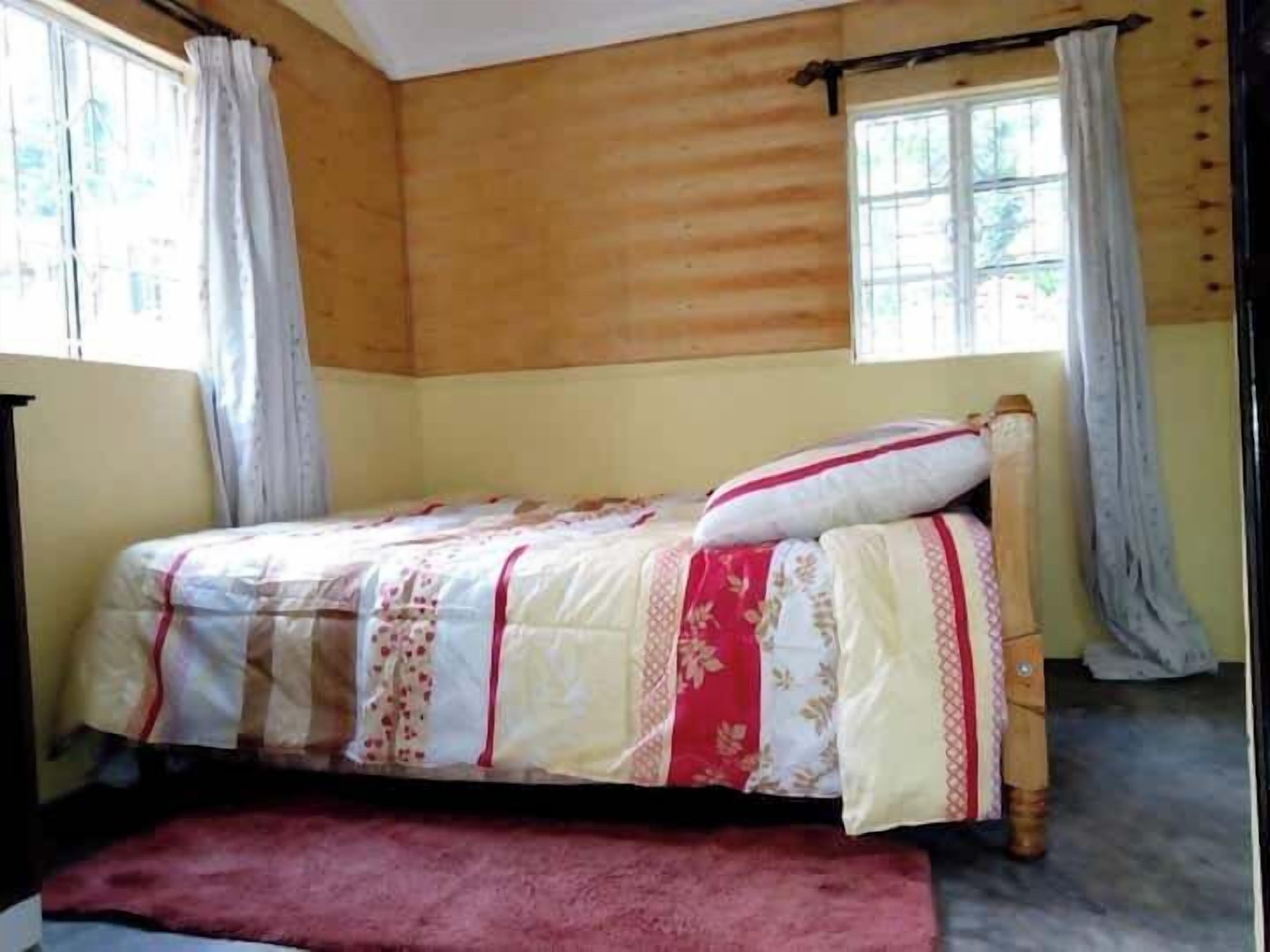 Cottage Deluxe, ban công, quang cảnh vườn | Truy cập Internet không dây miễn phí, bộ trải giường 