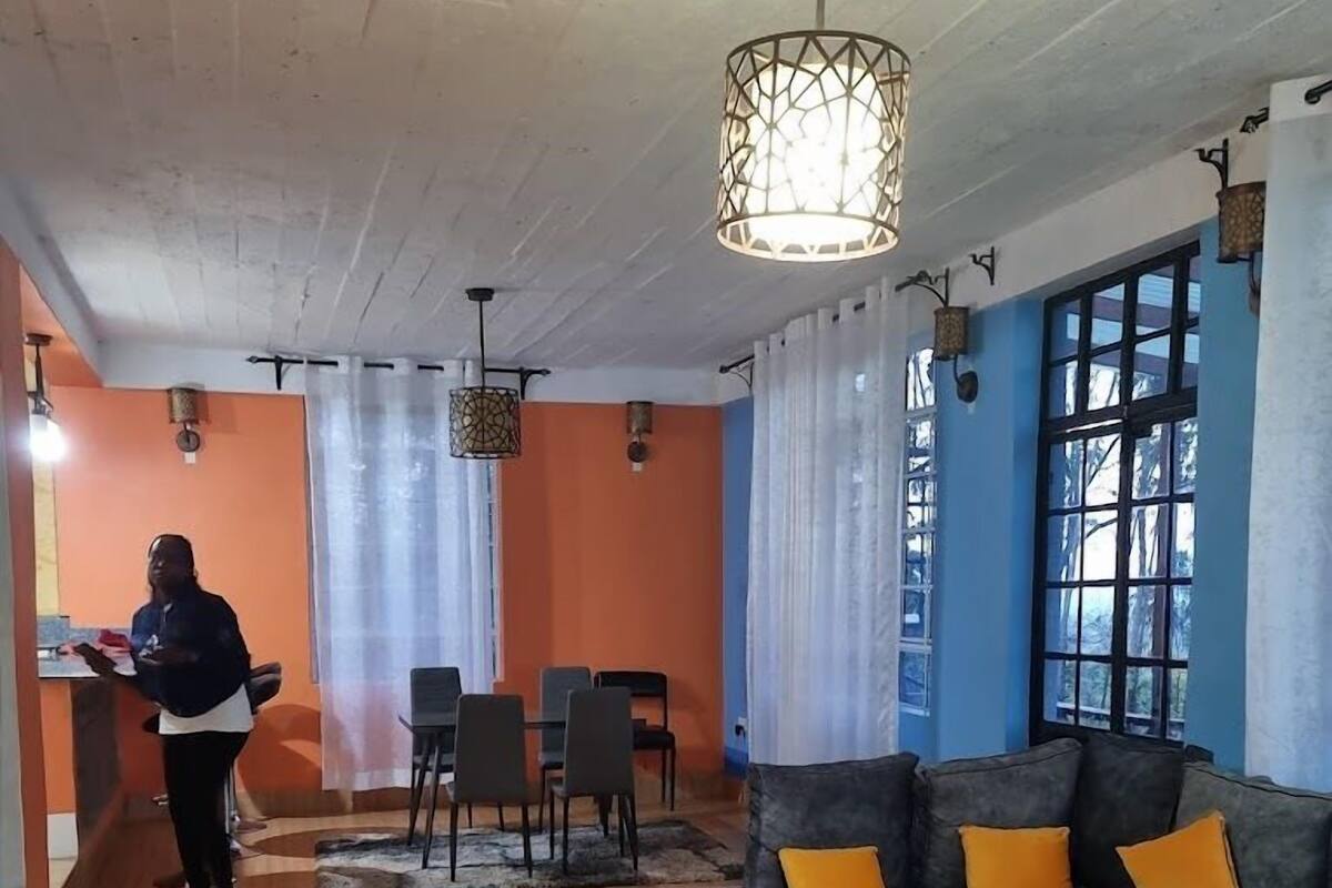 Deluxe Cottage, Balcony, Garden View | Living area | 32-inch Smart TV with digital channels