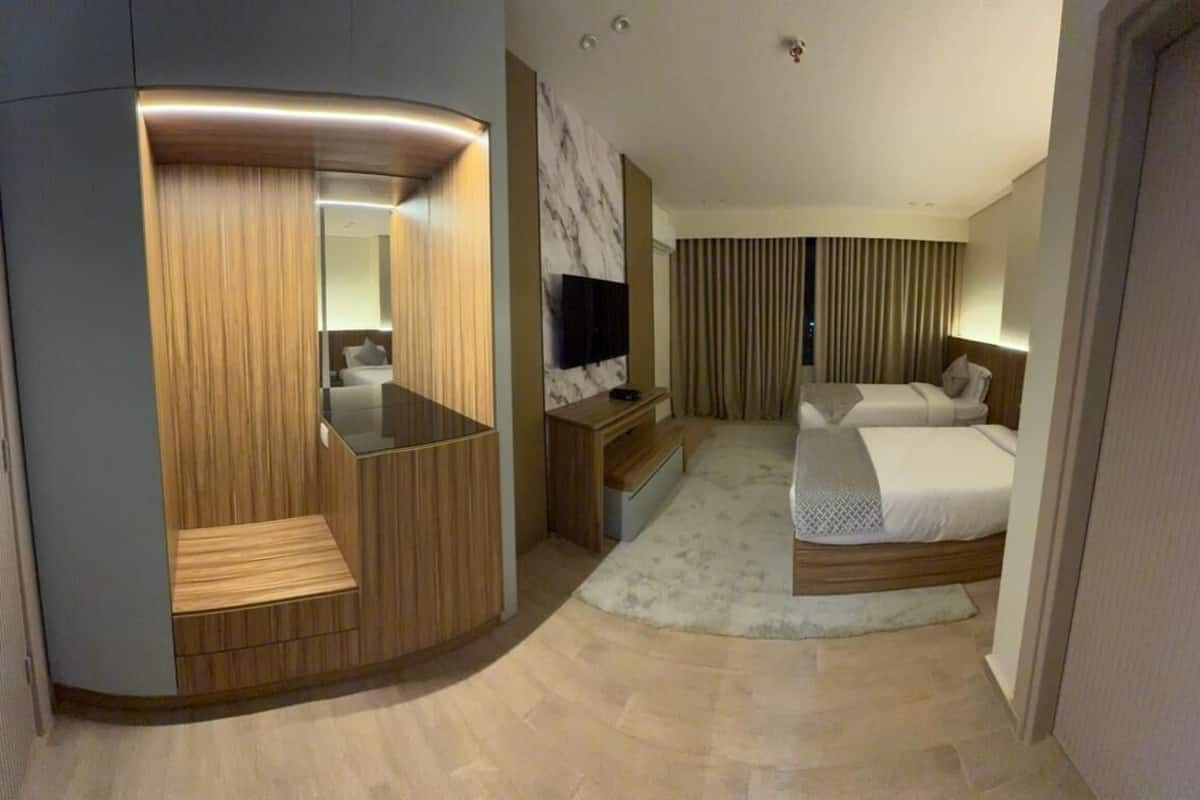 City Room | Premium bedding, memory foam beds, laptop workspace, blackout drapes