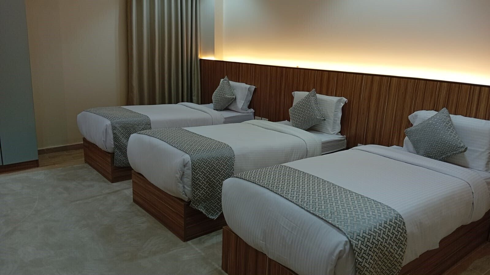 Premium bedding, memory foam beds, laptop workspace, blackout drapes