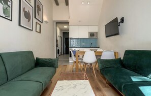 Appartement | Coin séjour | Télévision de 60 cm avec chaînes par câble
