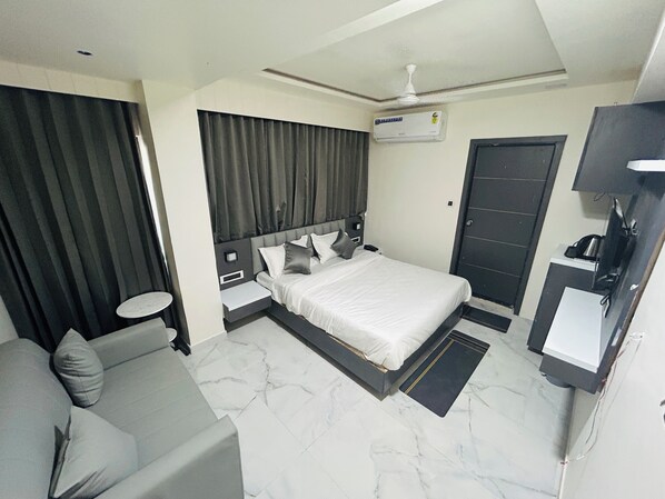 Deluxe Double Room, City View | Desk, laptop workspace, iron/ironing board, free WiFi - Hotel The Season (Ahmedabad)