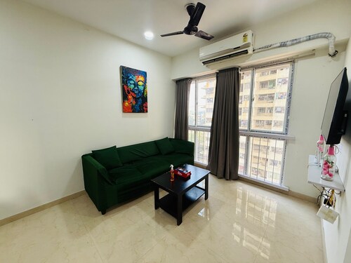 1BR Service Apart Parel 804 Near TMH By Florastays