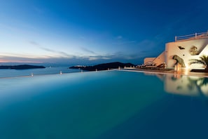 Indoor pool, seasonal outdoor pool, pool umbrellas, pool loungers