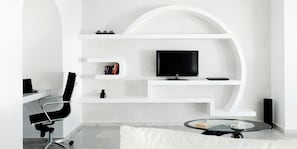 Villa with Hot Tub and Caldera View | Living room | 34-inch LCD TV with satellite channels - Anastasis Apartments and Spa (Santorini)