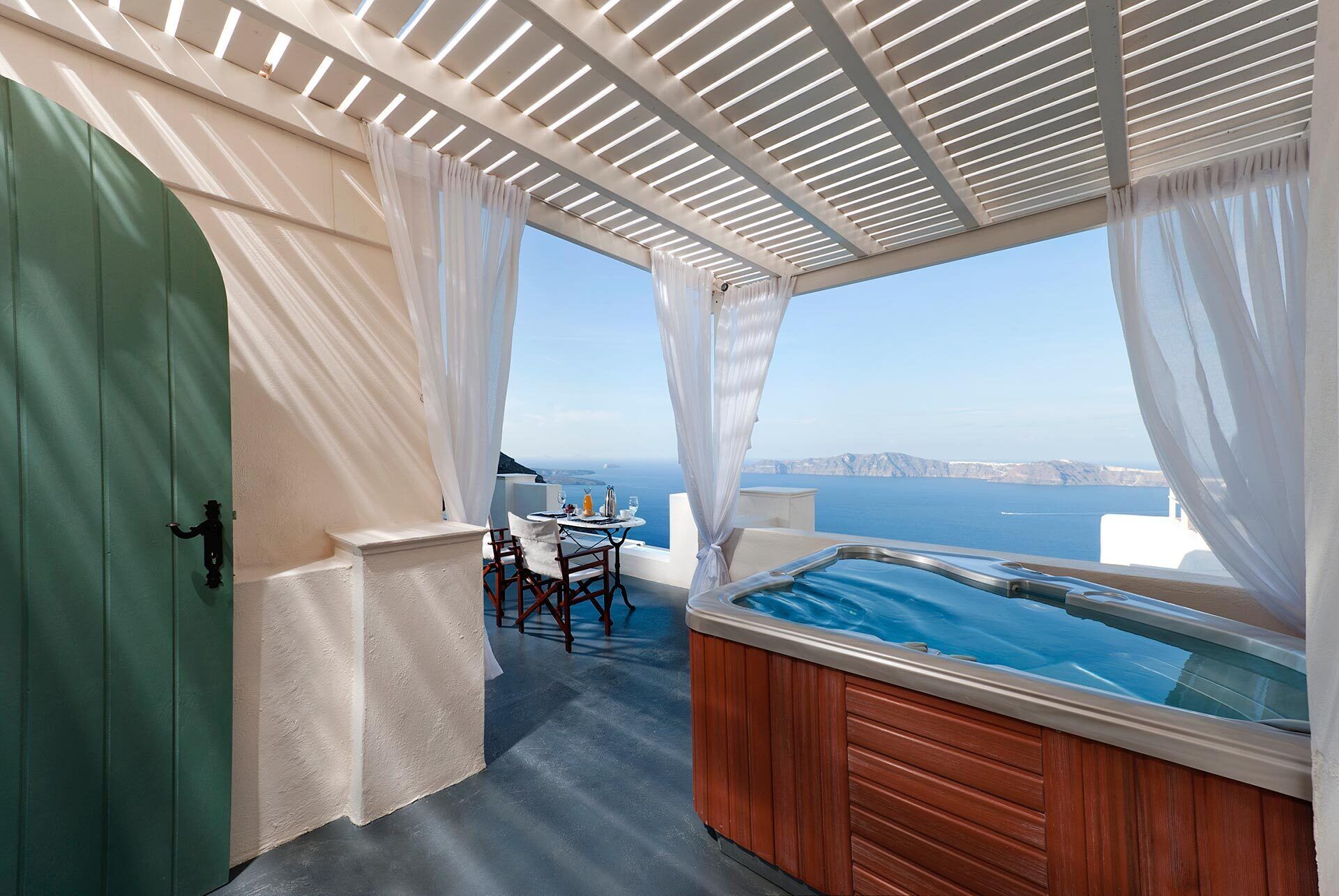 Suite with Hot Tub and Caldera View | Egyptian cotton sheets, premium bedding, in-room safe