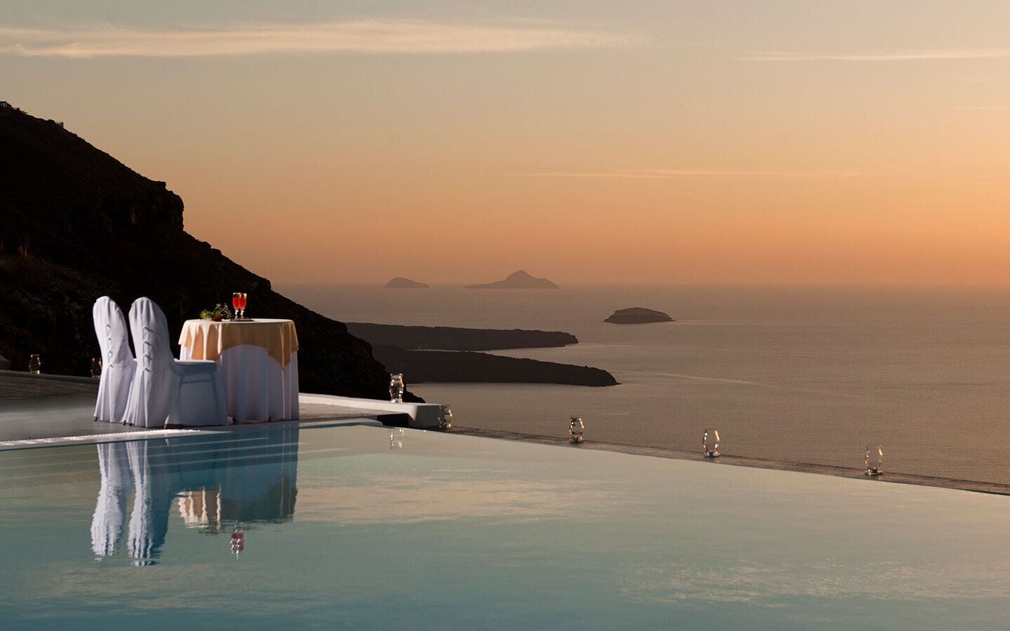 Indoor pool, seasonal outdoor pool, pool umbrellas, pool loungers