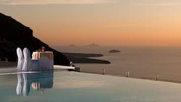 Indoor pool, seasonal outdoor pool, pool umbrellas, pool loungers