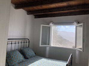 2 bedrooms, iron/ironing board, travel cot, bed sheets