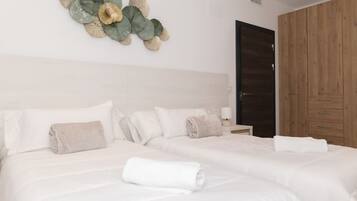 3 dormitorios, tabla de planchar con plancha, cuna de viaje y wifi