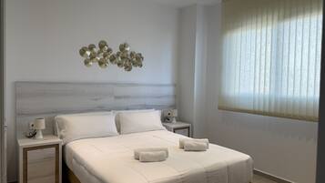 2 habitaciones, tabla de planchar con plancha, wifi y ropa de cama