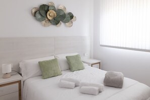 2 habitaciones, tabla de planchar con plancha, wifi y ropa de cama 