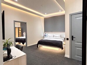 Family Quadruple Room, Garden View | In-room safe, blackout drapes, soundproofing, iron/ironing board