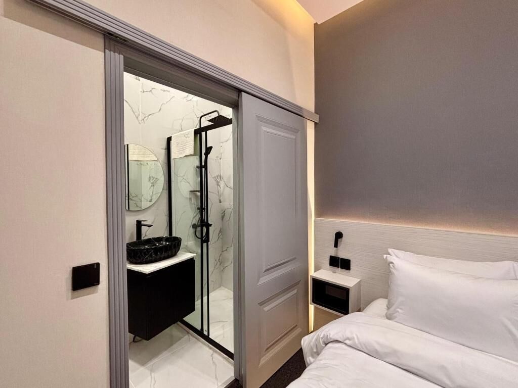 Economy Room | In-room safe, blackout curtains, soundproofing, iron/ironing board