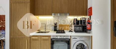 Apartment, Balcony, Pool View | Private kitchen