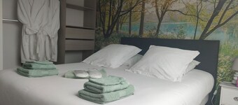 Room with outdoor spa, unlimited access, and private whirlpool spa